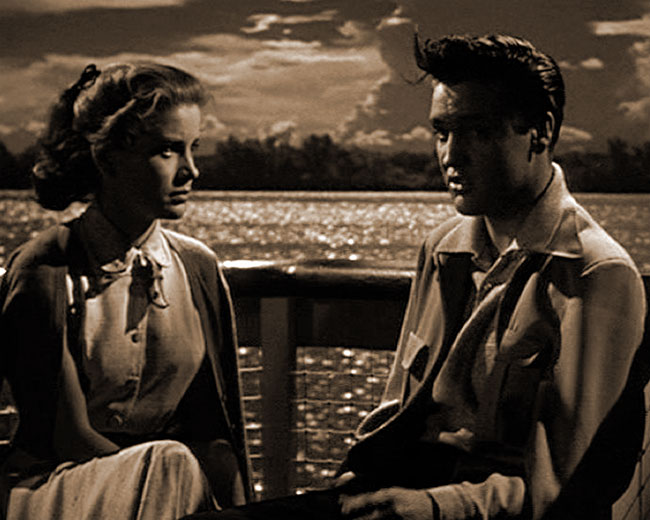 Nellie listens to Danny talk about his house in KING CREOLE