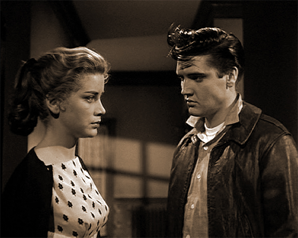 Nellie (Dolores Hart) and "George" (Elvis Presley) outside of Room 205 in KING CREOLE
