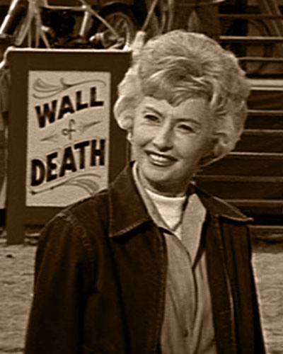 Barbara Stanwyck is Maggie Morgan in 1964's ROUSTABOUT (Paramount)