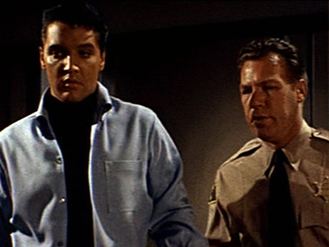 Elvis Presley is Charlie and K.L. Smith is the Sheriff in 1964's ROUSTABOUT (Paramount)