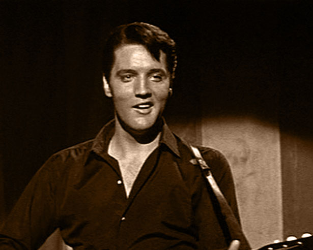 Charlie Rogers (Elvis Presley) begins to draw a crowd for Morgan Shows when the carnival signs him on as a singer in 1964's ROUSTABOUT (Paramount)