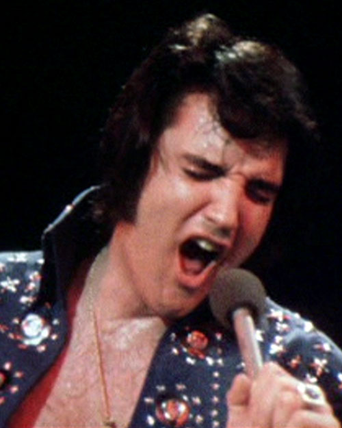 Elvis Presley performing at the Greensboro Coliseum on April 14, 1972 (MGM)